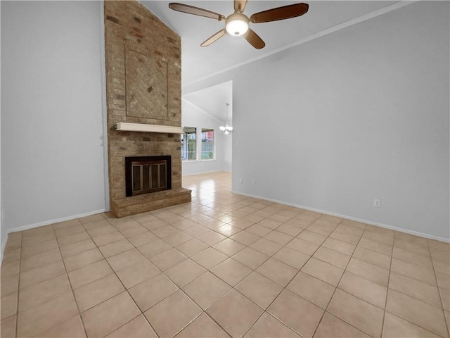 unfurnished living room with crown molding, light tile patterned floors, a fireplace, lofted ceiling, and ceiling fan with notable chandelier