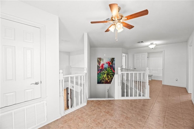 200 Elm St, Portland, TX 78374 - hall featuring an upstairs landing and tile patterned floors