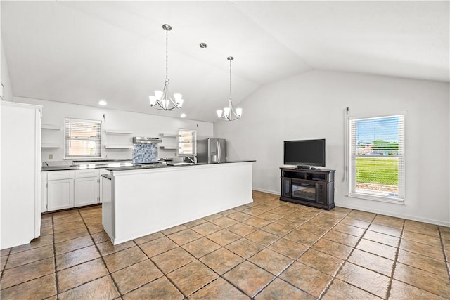 200 Elm St, Portland, TX 78374 - kitchen featuring a chandelier, lofted ceiling, open shelves, white cabinets, and dark countertops