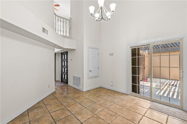 200 Elm St, Portland, TX 78374 - foyer entrance featuring a towering ceiling, a chandelier, and a ceiling fan