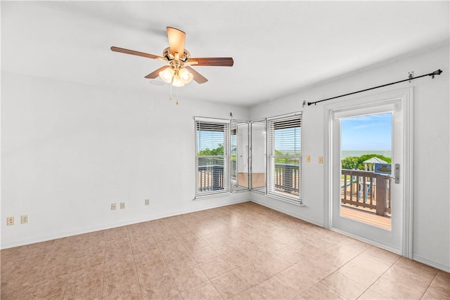 200 Elm St, Portland, TX 78374 - spare room with ceiling fan and light tile patterned flooring