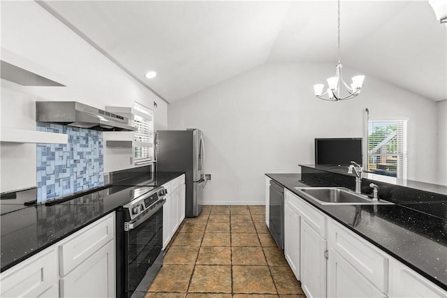 200 Elm St, Portland, TX 78374 - kitchen featuring stainless steel appliances, extractor fan, lofted ceiling, white cabinetry, and a chandelier