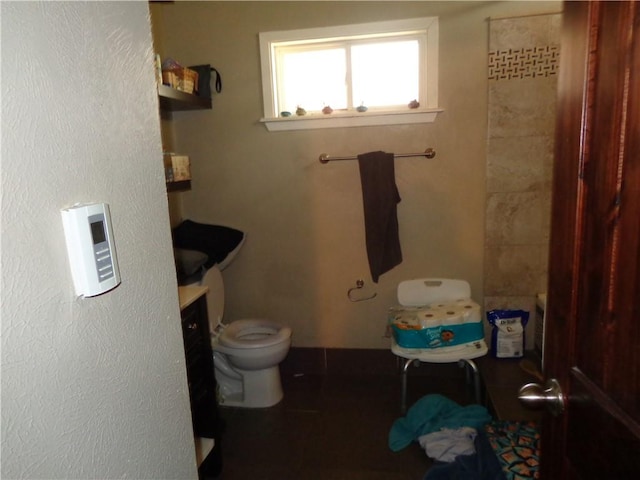 bathroom featuring toilet