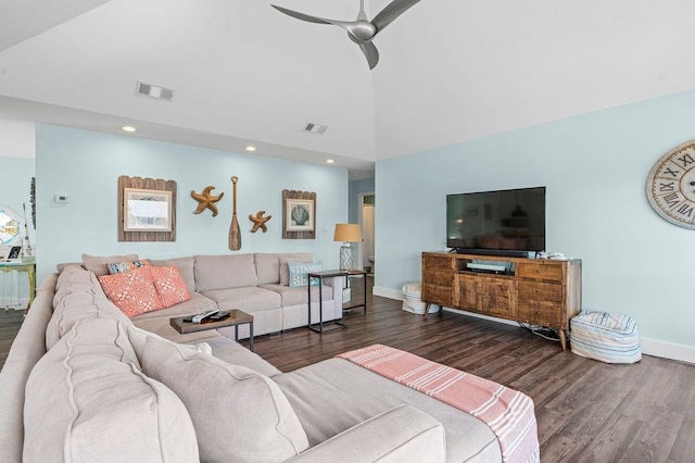 living room with ceiling fan and dark hardwood / wood-style floors