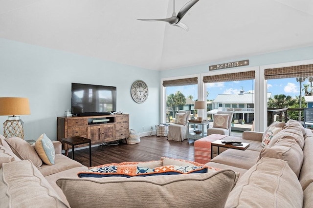 living room featuring dark wood-type flooring, ceiling fan, and lofted ceiling