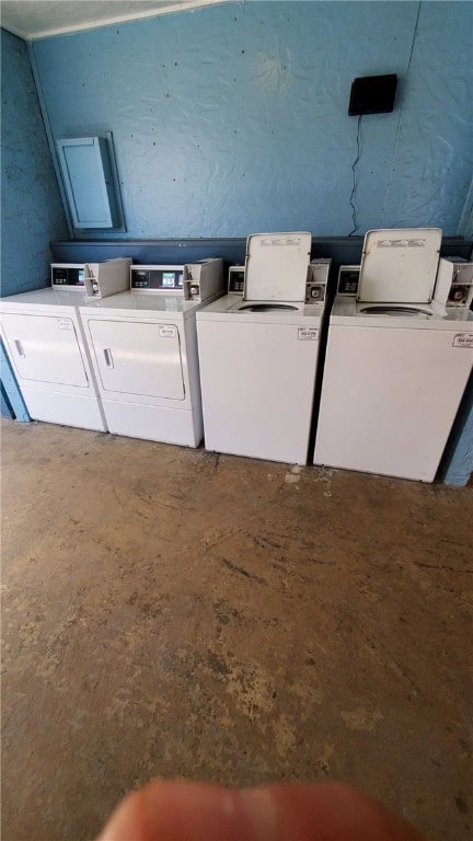 laundry room featuring washing machine and clothes dryer