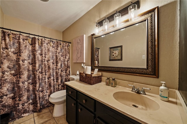 5213 Inverness Dr, Corpus Christi, TX 78413 - bathroom with a textured wall, tile patterned floors, vanity, and a shower with shower curtain