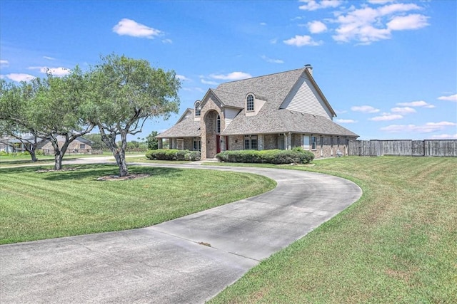 view of front of property with a front lawn