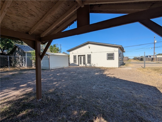 exterior space with a shed