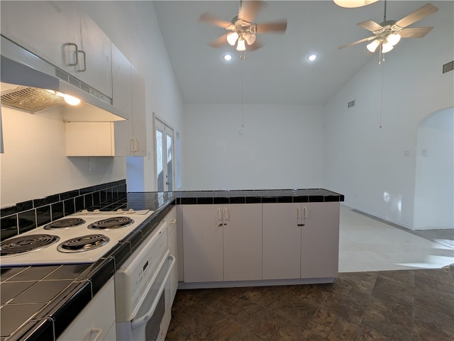 kitchen featuring white cabinets, kitchen peninsula, high vaulted ceiling, and white stovetop