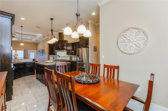 dining space featuring recessed lighting, a raised ceiling, visible vents, and crown molding