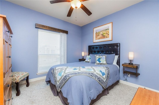 bedroom with baseboards, a ceiling fan, and carpet flooring