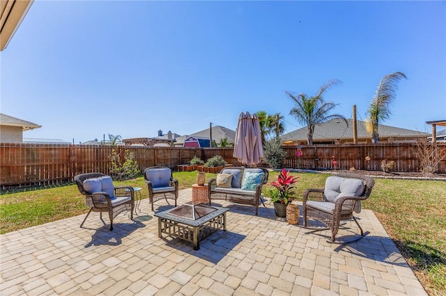 view of patio / terrace featuring outdoor lounge area and a fenced backyard