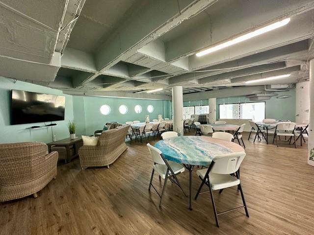 5973 State Highway 361 Unit 203, Port Aransas, TX 78373 - dining area featuring wood finished floors