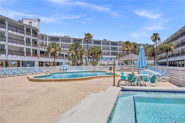 view of swimming pool featuring a patio