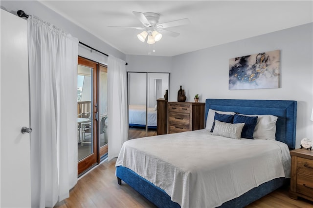 bedroom with ceiling fan, a closet, and light wood-type flooring