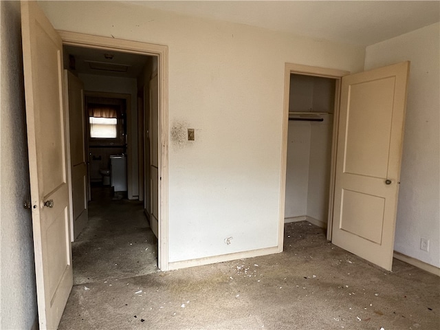 unfurnished bedroom with a closet