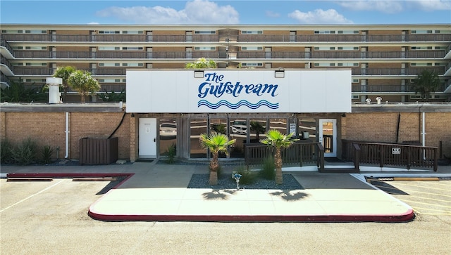 14810 Windward Dr Unit 203, Corpus Christi, TX 78418 - view of building exterior featuring uncovered parking