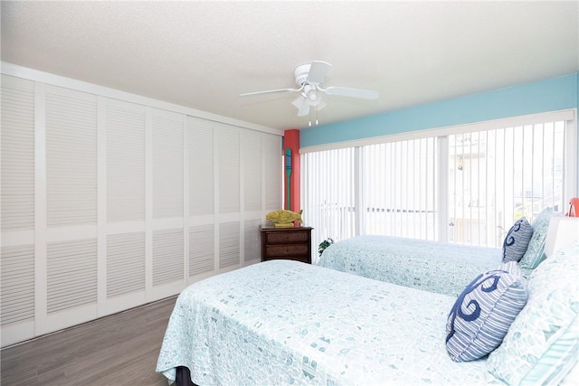14810 Windward Dr Unit 203, Corpus Christi, TX 78418 - bedroom with wood finished floors and ceiling fan