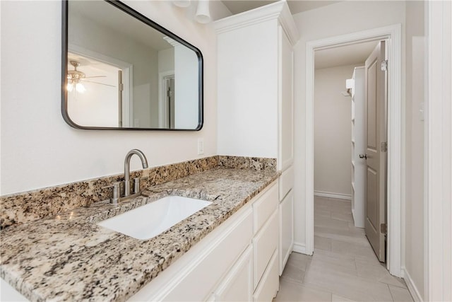 2325 Roseland Dr, Corpus Christi, TX 78414 - bathroom with baseboards, a ceiling fan, and vanity
