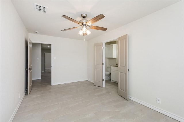 2325 Roseland Dr, Corpus Christi, TX 78414 - unfurnished bedroom featuring visible vents, ceiling fan, and baseboards