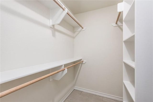 2325 Roseland Dr, Corpus Christi, TX 78414 - walk in closet with light tile patterned flooring