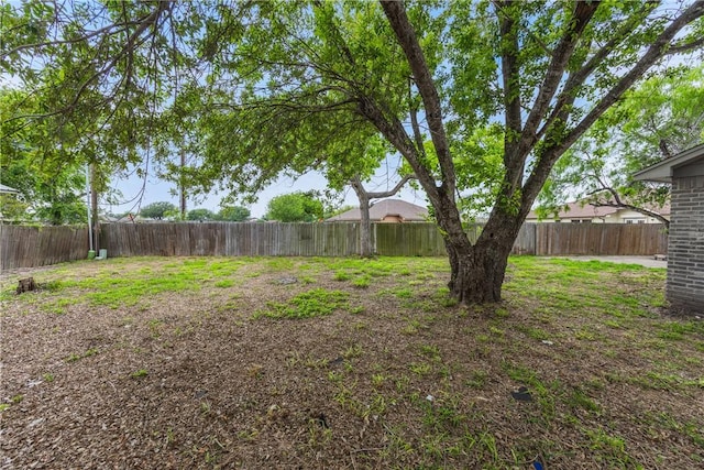2325 Roseland Dr, Corpus Christi, TX 78414 - view of yard featuring a fenced backyard