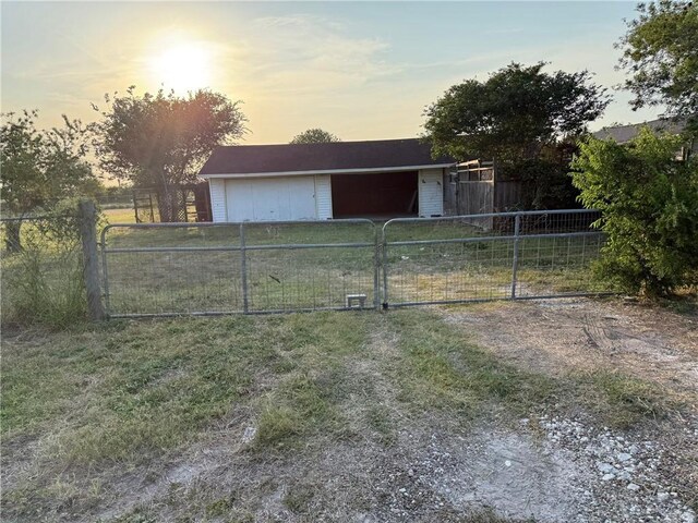 9553 County Road 249th Cir, Mathis, TX 78368 - view of outbuilding with a gate
