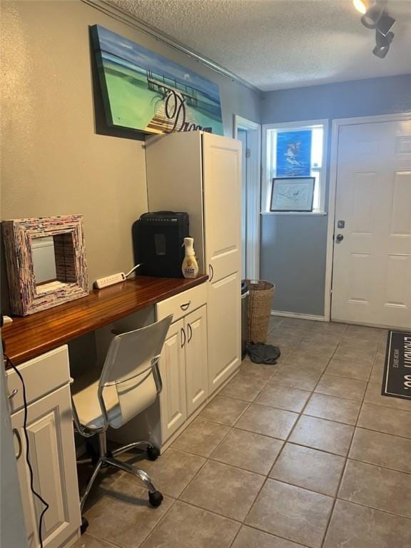 66 Redfish Dr, Rockport, TX 78382 - office area with light tile patterned floors and a textured ceiling