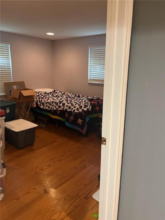 66 Redfish Dr, Rockport, TX 78382 - bedroom with wood finished floors