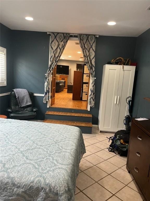 66 Redfish Dr, Rockport, TX 78382 - bedroom with light tile patterned floors and recessed lighting