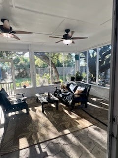 sunroom / solarium with ceiling fan