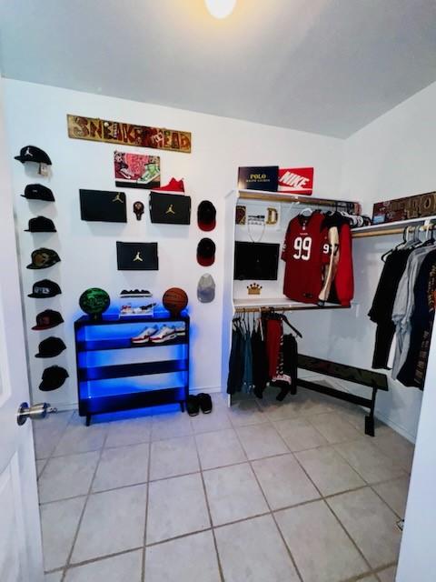 861 Redwood Ave, Rockport, TX 78382 - mudroom with light tile patterned flooring and baseboards