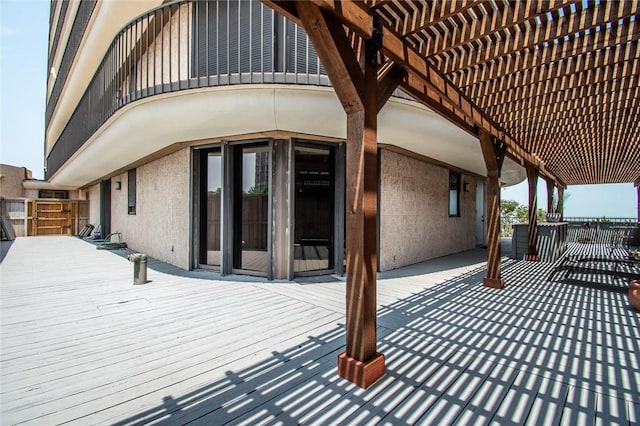 wooden deck with a pergola