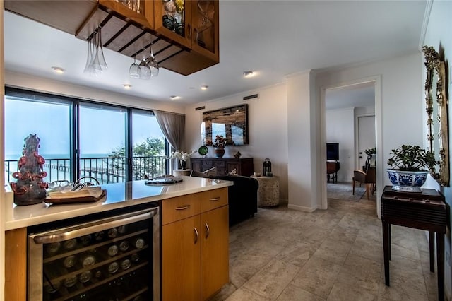 bar featuring wine cooler, visible vents, and baseboards