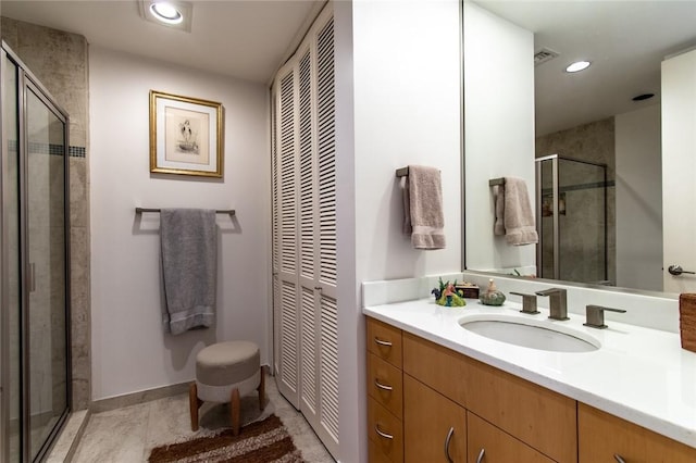 full bath with recessed lighting, a closet, visible vents, a stall shower, and vanity