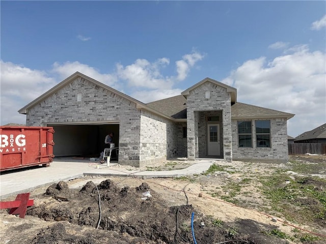 view of front of property with a garage