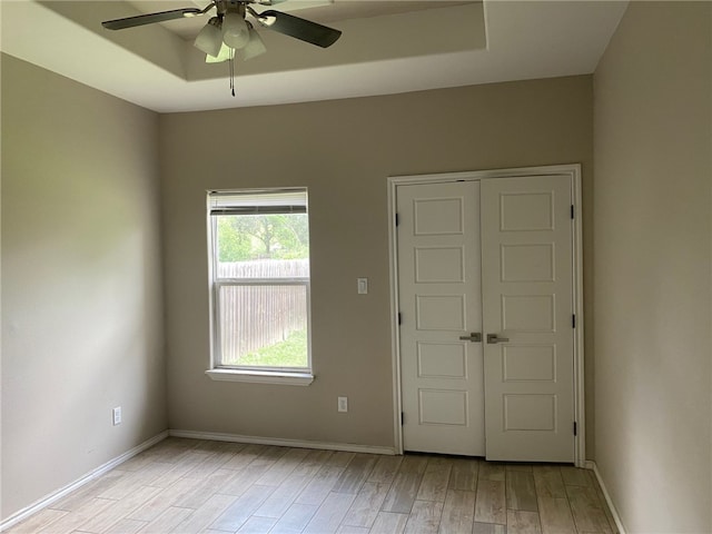 1622 S Reynolds St, Alice, TX 78332 - empty room featuring ceiling fan, light wood-style floors, and baseboards