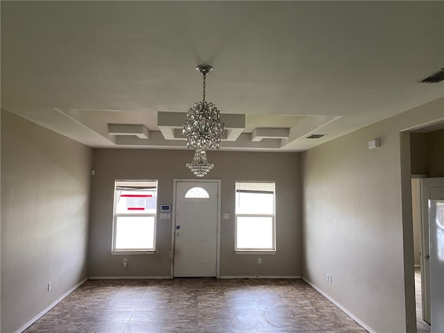1622 S Reynolds St, Alice, TX 78332 - foyer with healthy amount of natural light, a chandelier, and baseboards