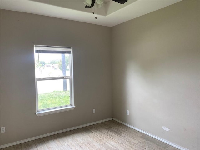 1622 S Reynolds St, Alice, TX 78332 - empty room with ceiling fan, light wood-type flooring, and baseboards