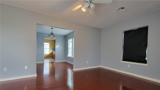 unfurnished room with wood-type flooring and ceiling fan