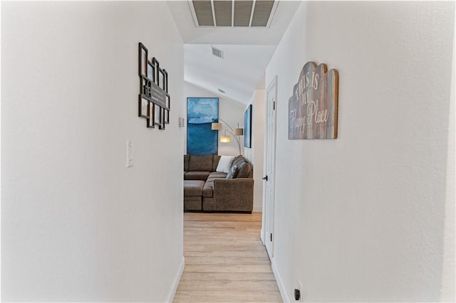 15209 Dasmarinas Dr, Corpus Christi, TX 78418 - hallway with light wood finished floors and vaulted ceiling