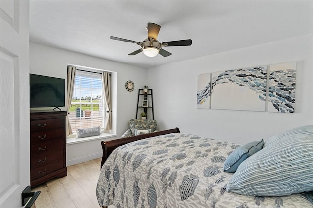 15209 Dasmarinas Dr, Corpus Christi, TX 78418 - bedroom featuring light wood-style floors and a ceiling fan