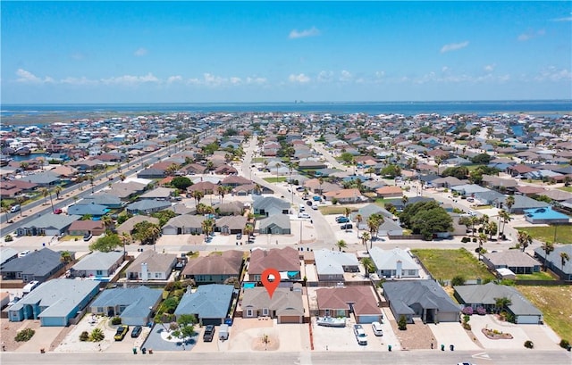 15209 Dasmarinas Dr, Corpus Christi, TX 78418 - aerial overview of property's location featuring nearby suburban area and a nearby body of water