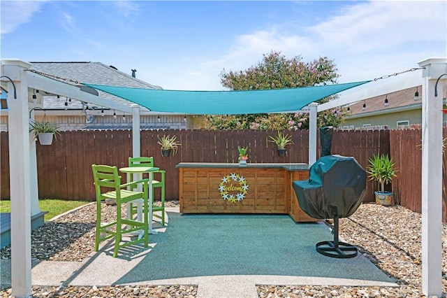 15209 Dasmarinas Dr, Corpus Christi, TX 78418 - fenced backyard featuring grilling area and a patio area