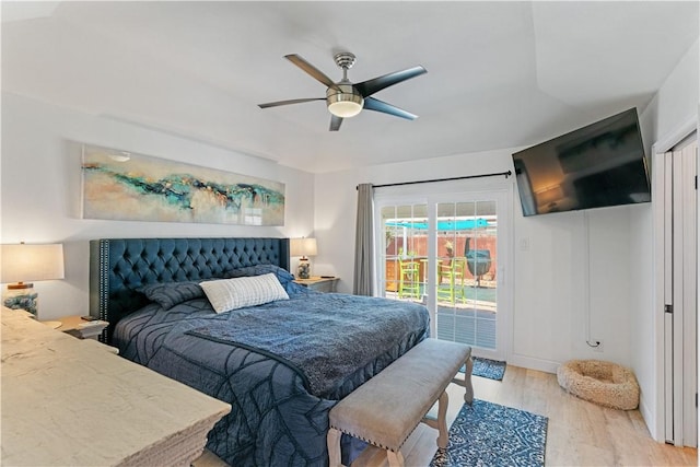 15209 Dasmarinas Dr, Corpus Christi, TX 78418 - bedroom with access to exterior, light wood-style flooring, and a ceiling fan