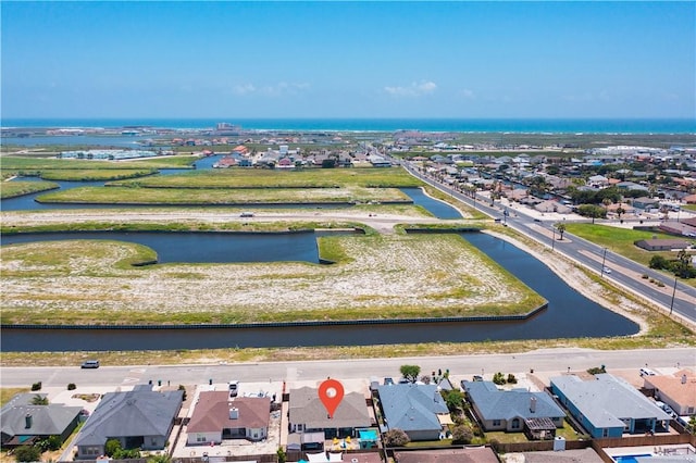 15209 Dasmarinas Dr, Corpus Christi, TX 78418 - aerial perspective of suburban area with a large body of water and a notable bridge