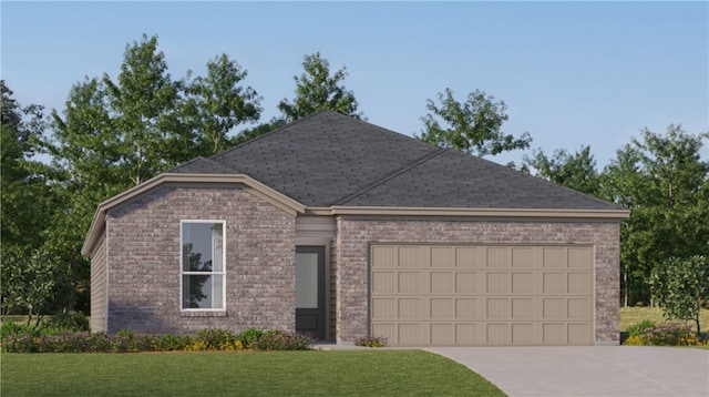 view of front facade with a garage and a front yard