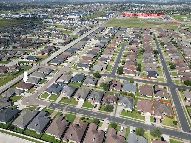 6913 Mets Ct, Corpus Christi, TX 78414 - aerial overview of property's location with nearby suburban area