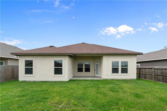 6913 Mets Ct, Corpus Christi, TX 78414 - back of property featuring a patio, stucco siding, and roof with shingles